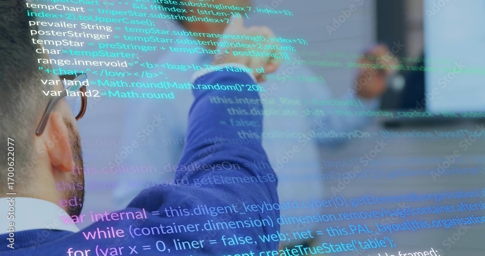 Poster reviewing code, two engineers collaborating on monitor in meeting room, with code overlays