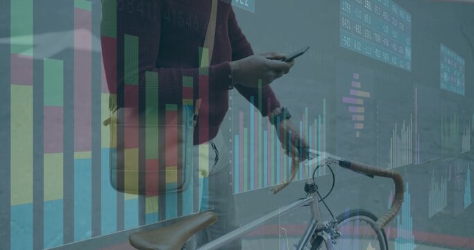 Balancing bicycle on waterfront walkway holding smartphone and bag, man tracking financial charts