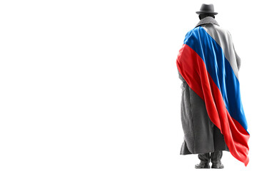 back view of cold war style spy in retro hat and long coat covering his shoulders with russian flag, isolated over white (transparent) background