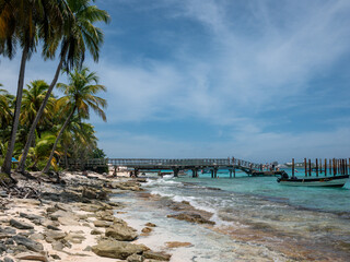 Johnny Cay (San Andres), Colombia, 08.20.2025: view of the small cay with white sand, crystalline water and palm vegetation reachable by tourist boats from the coast of San Andres island.