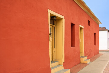 Fototapeta premium Beautiful, Colorful Old Adobe House in the historic Barrio Viejo neighborhood. Pima County, Tucson, Arizona, USA.