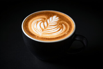 Coffee cup with latte art on black background. Ai generate.	
