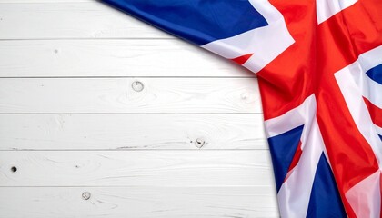 A flag unfurled across quiet grain—where bold colors meet pale wood in a quiet tribute to tradition and pride.