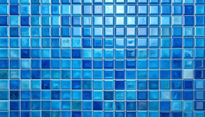 Fototapeta premium Blue mosaic tiles. Different shades, square shapes, and light reflection create a calming, textured surface