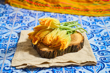 Squash blossoms as healthy seasonal ingredient in Mexican cooking, flor de calabaza o ahuyama