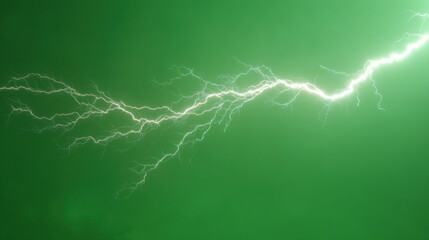Lightning strikes against green background