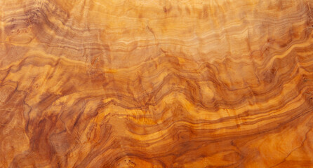 Brown wood background. Olive light bright wooden texture. Top view, copy space, close up.
