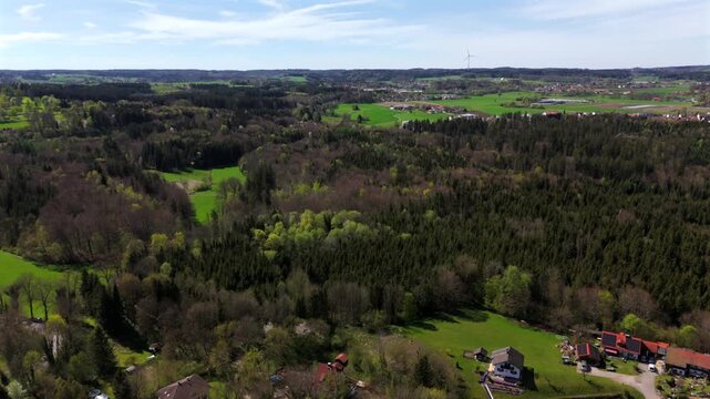 Aerial view of Schloss Elkofen, also known as Burg Elkofen, Schloss Elkhofen, near Grafing bei Muenchen, Germany. A medieval fortress surrounded by green fields in the Bavarian countryside. 