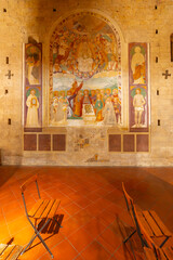 Obraz premium Ancient religious fresco depicting assumption of Mary inside Church of Santa Maria Assunta in Monteriggioni, Tuscany, Italy