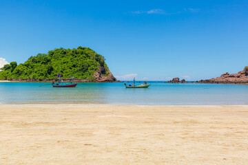Seas and beaches on tropical islands in Thailand,Thai traditional wooden longtail boat and beautiful sand Ao Phra Nang Beach in Krabi province. Ao Nang, Thailand. Travel summer concept.