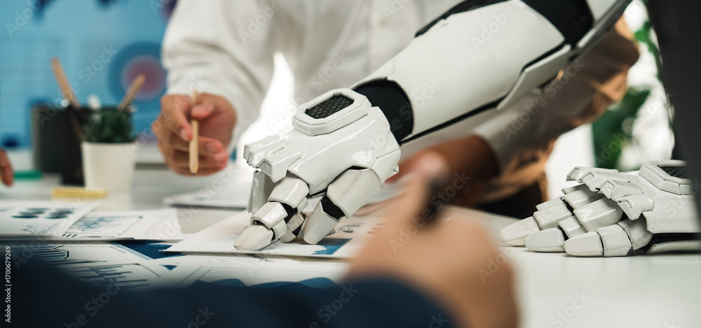 Poster a robotic hand and human hands collaborate on project planning in a sleek office space, symbolizing 