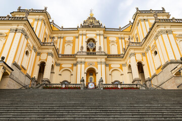 Obraz premium Basilica of the Visitation of the Blessed Virgin Mary in Wambierzyce, Poland, dominating the staircase