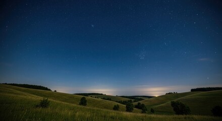 Starry night over rolling hills. Lush, grassy fields stretch across gentle slopes under a vast, star-studded sky
