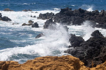 Waves against the rocky coast