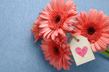 Pink gerbera daisies with heart tag lovely flowers romantic gift