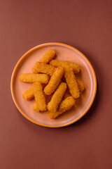 Mozzarella cheese sticks, crispy nutritious fast food. Cheese sticks as food background