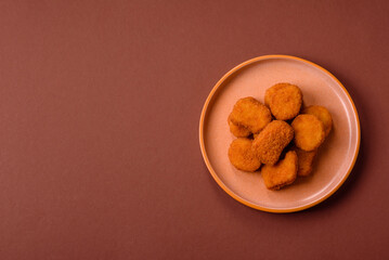 Chicken nugget with sauce, crispy nutritious fast food. Chicken nugget