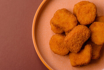 Chicken nugget with sauce, crispy nutritious fast food. Chicken nugget