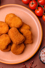 Chicken nugget with sauce, crispy nutritious fast food. Chicken nugget