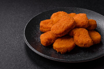Chicken nugget with sauce, crispy nutritious fast food. Chicken nugget