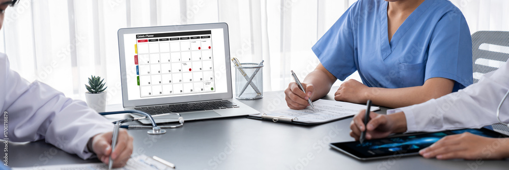 Poster calendar on computer software application for brisk schedule planning for personal organizer and onl