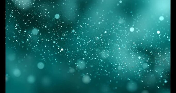 Abstract teal background with shimmering bokeh lights and sparkling particles floating in a magical atmospheric glow