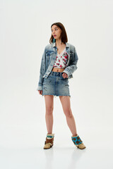 Fashion shooting in studio . Professional model , fashionable clothes and style, new collection. stylish look