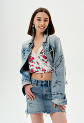 Fashion shooting in studio . Professional model , fashionable clothes and style, new collection. stylish look
