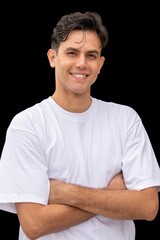 A man is smiling and wearing a white shirt