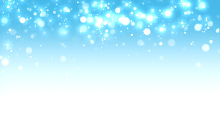 Abstract shimmering bright blue and white bokeh lights creating a festive celebratory glowing background effect