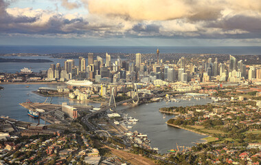 Aerial view of Anzac Bridge, Sydney CBD, Sydney tower and financial district skyscrapers in the morning light. © MMxeon