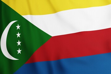 Waving flag of Comoros on textile, close up