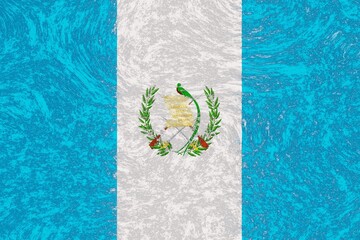 Flag of Guatemala depicted on a rough material like concrete or weathered plaster wall