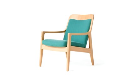 A light wood frame armchair with teal cushions isolated on a white background in a studio shot