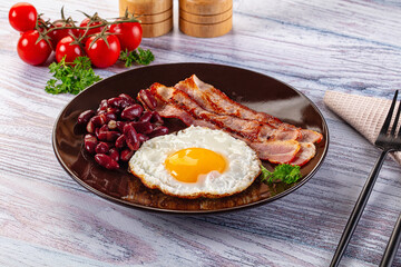 English breakfast with egg, bean and bacon