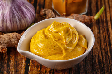 Indian yellow spicy curry sauce