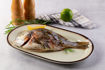 Baked dorada fish with spices