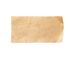 Close up of a square chapati displaying its texture and color under studio lighting