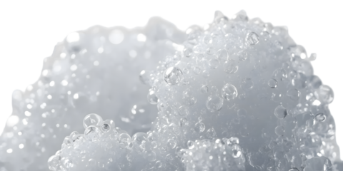 Microscopic Ice Crystal: A mesmerizing close-up of ice crystal captures the ephemeral beauty of a frozen world, where delicate structures and tiny air bubbles glisten.