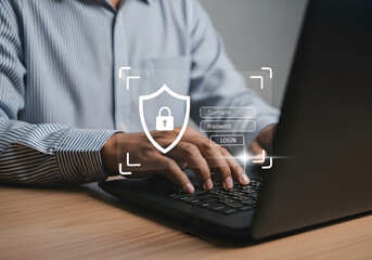 Man typing on laptop with digital security shield and login interface overlay, representing cybersecurity and data protection