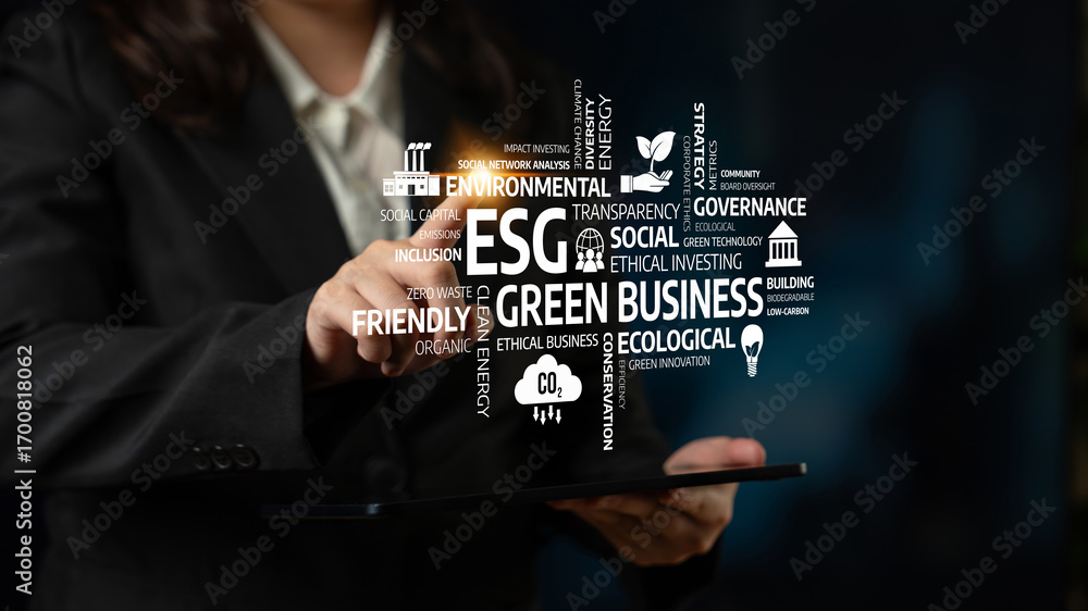 Aufkleber a professional using digital technology to showcase esg principles focusing on sustainability and et