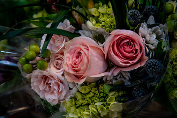 Beautiful bouquet of pink roses in soft light.