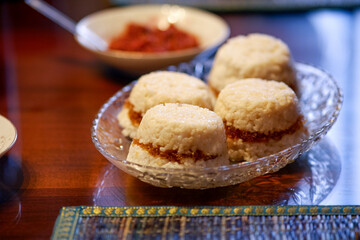 Puttu or steamed rice layered with coconut shavings.