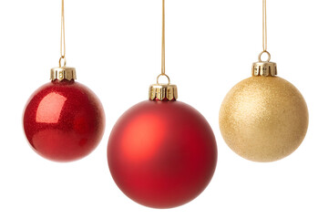 Three festive christmas ornaments including red and gold baubles hanging on strings isolated on transparent background