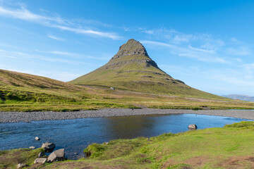 mountain Kirkjufell and river in Iceland