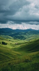 Fototapeta premium Green hills under a cloudy sky