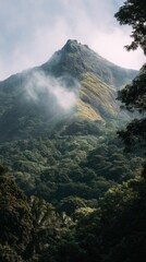 Majestic mountain peak rising above lush greenery