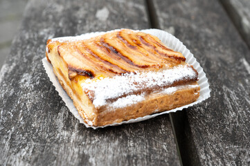 Puffy pastry with apples and powdered sugar in Wachtebeke, East Flanders, Belgium