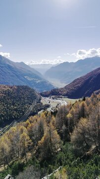 4K cinematic aerial drone footage of Alp Gr&uuml;m in the Swiss Alps, Graub&uuml;nden, Switzerland. The video shows dramatic mountain landscape, railway line, and panoramic alpine views. Perfect for travel,