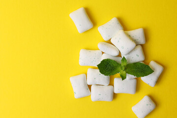 mint chewing gum and mint on the table. Fresh breath, oral care 
